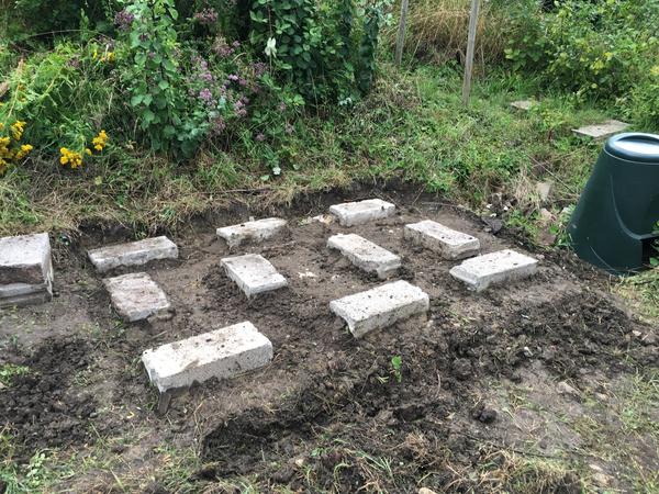 Breeze blocks in position for a base.